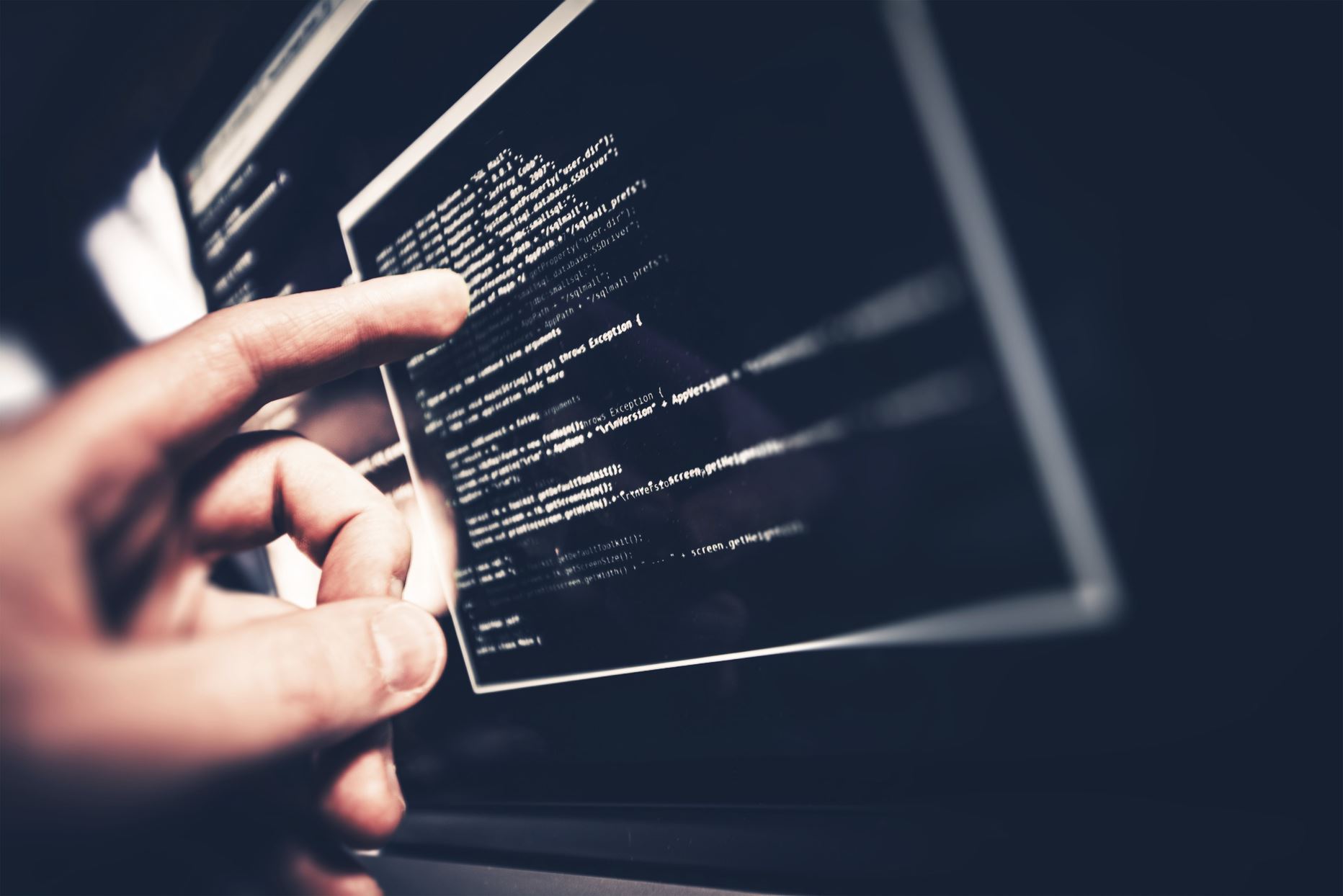 person pointing at the codes
