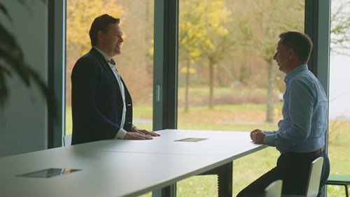 Two men having a business conversation