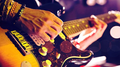 Man playing a guitar