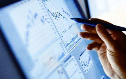 person drawing graphs on the screen