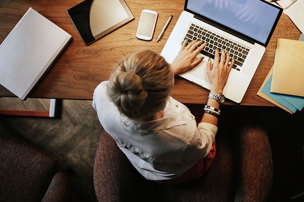 a person typing on a computer
