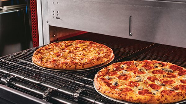 Domino's pizza in the oven
