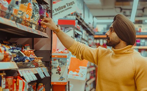 Man shopping for food at a store