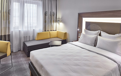 Bed in a hotel room