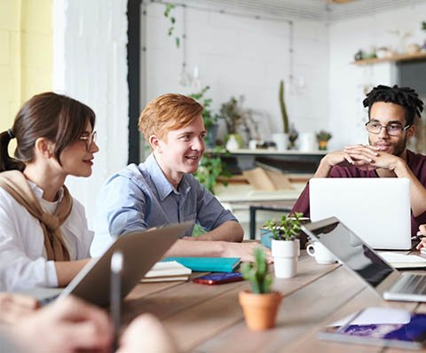 people having a meeting in a modern office