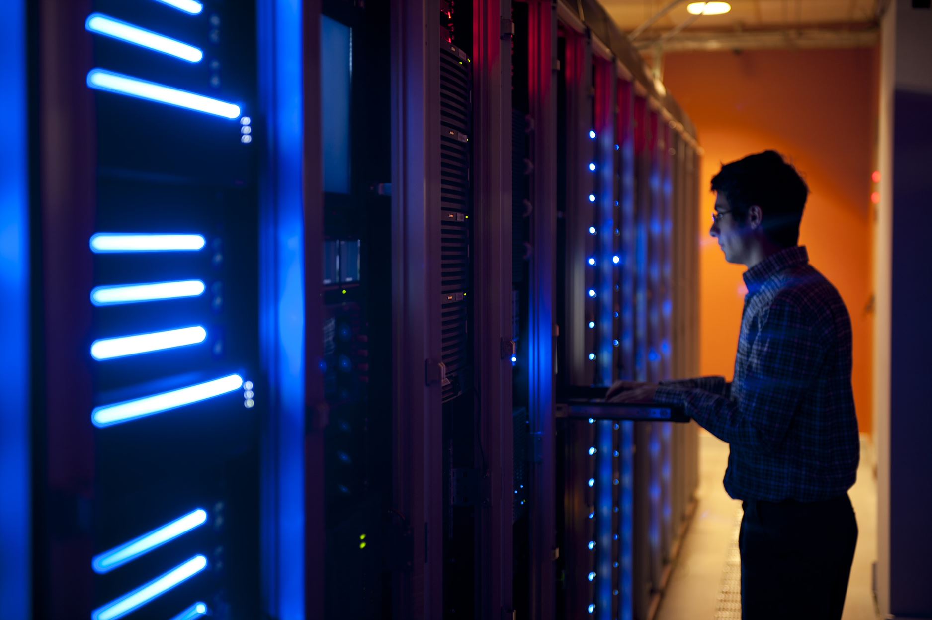 person in front of the servers
