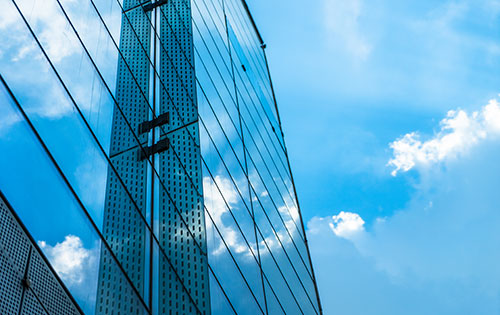 building with glasses and sky