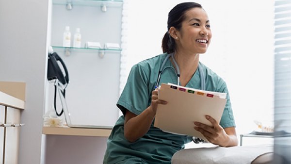 Doctor reading a chart