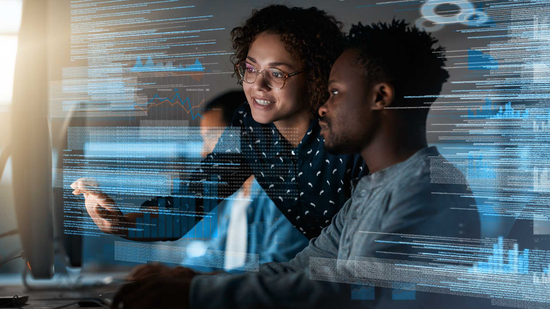 two people looking a screen