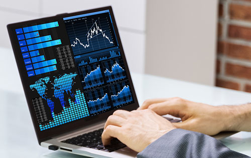 laptop screen with graphs