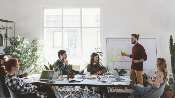 people having a meeting in a modern office