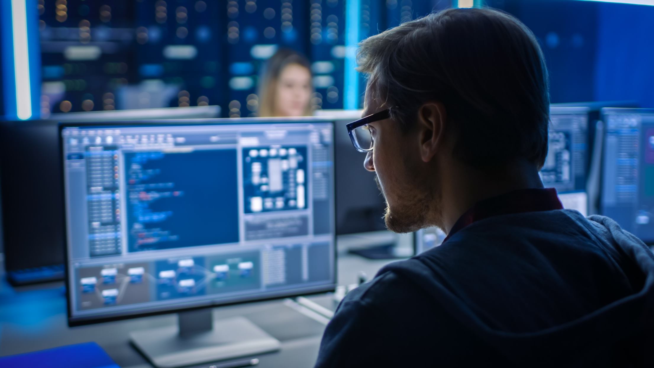 person looking at codes on the screen