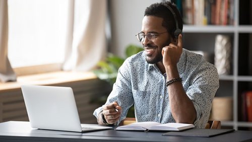 Man working and smiling