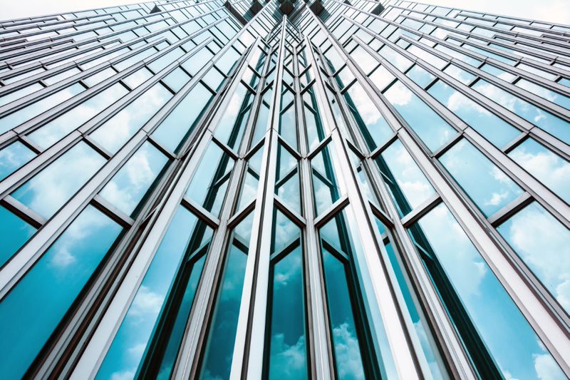 building with glasses from below