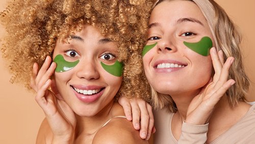 Two women with eye patches