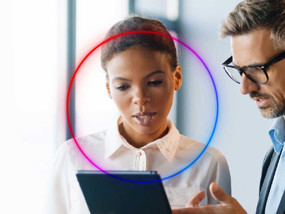 two people looking at a screen